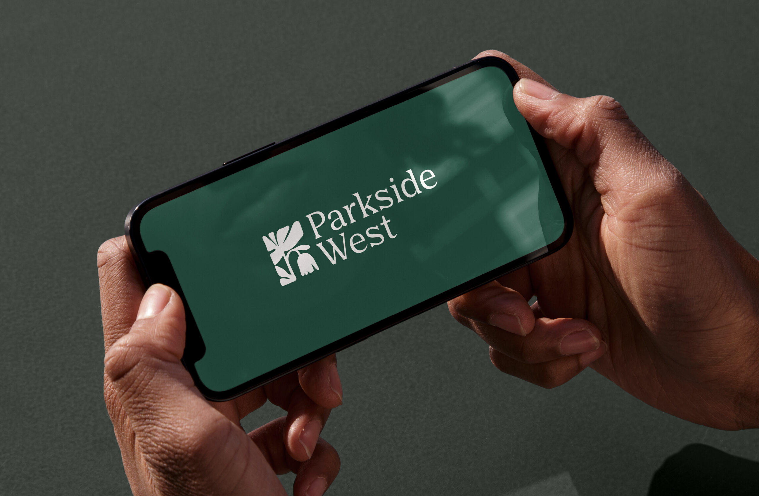 parkside west white logo on green iphone scree