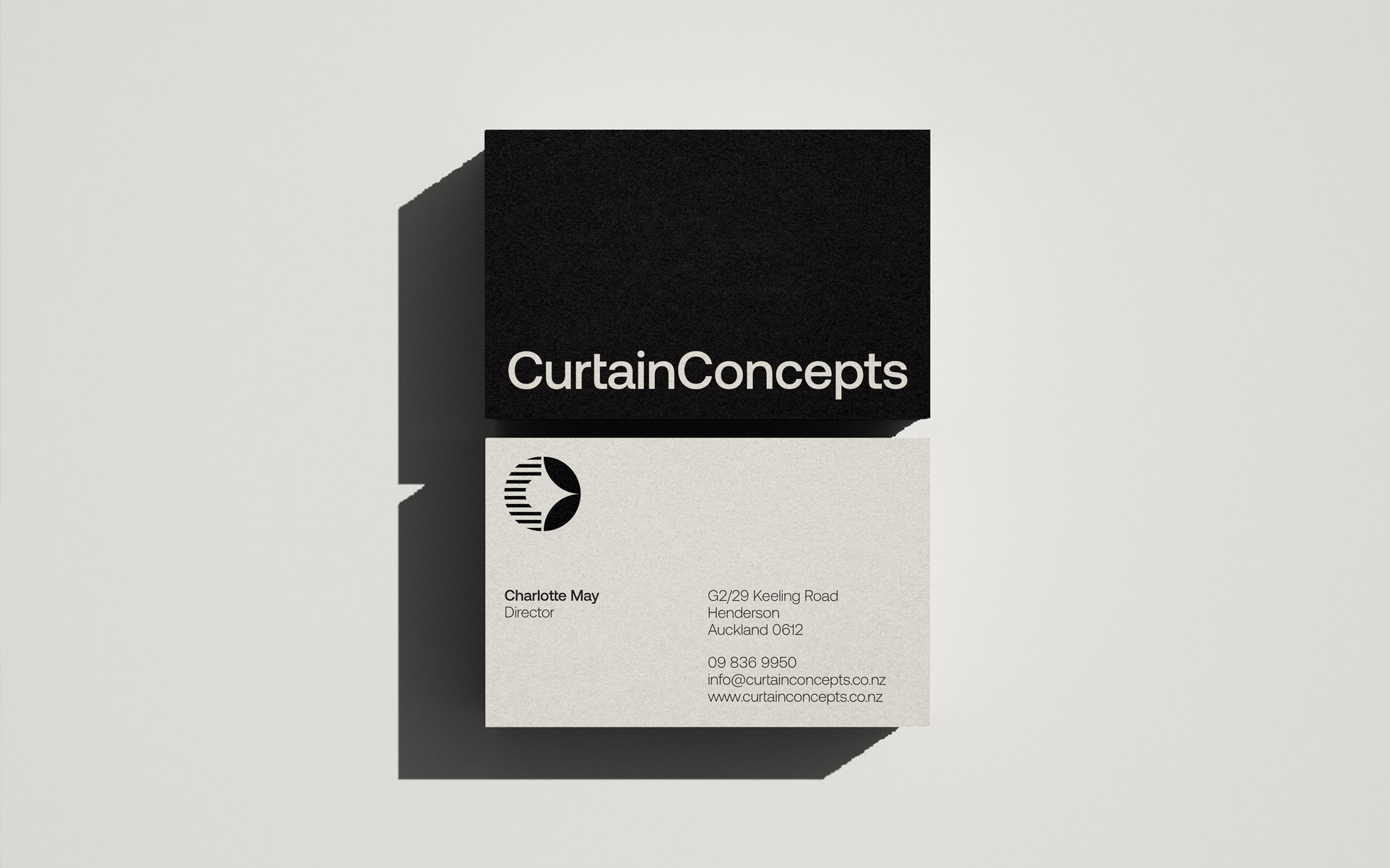 black and white business card with logo and icon